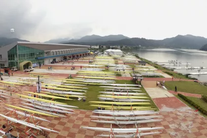 Photo of a bunch of surfboards that are sitting in the grass, WC Chungju, South Korea, August 2013, Reinder Nijhoff