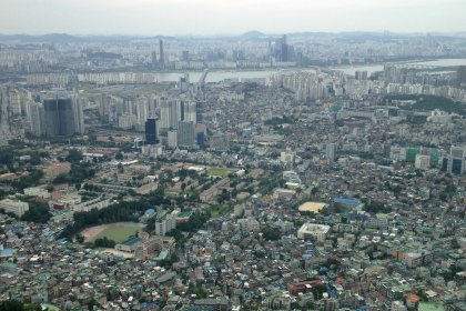 Photo of an aerial view of a city with lots of tall buildings, WC Chungju, South Korea, August 2013, Reinder Nijhoff