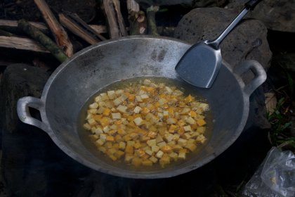 Photo of a pan filled with food sitting on top of a stove, Indonesia, August 2014, Reinder Nijhoff