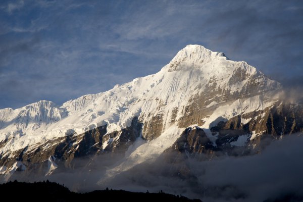 Photo of a snow covered mountain with clouds in the foreground, Myanmar, India, Nepal, June 2015, Reinder Nijhoff
