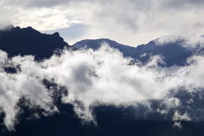 Photo of a view of a mountain range covered in clouds, Myanmar, India, Nepal, June 2015, Reinder Nijhoff