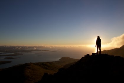 Photo of a person standing on top of a mountain at sunset, Iceland, September 2015, Reinder Nijhoff