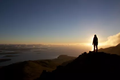Photo of a person standing on top of a mountain at sunset, Iceland, September 2015, Reinder Nijhoff