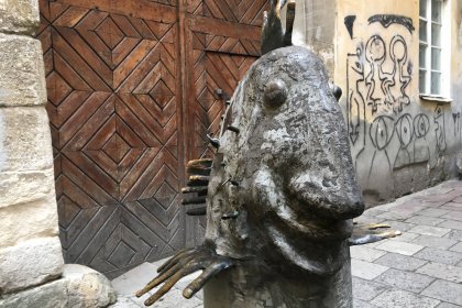 Photo of a statue of a fish on the side of a building, Lviv, Ukraine, September 2016, Reinder Nijhoff