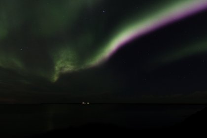 Photo of a green and purple aurora bore in the night sky, Northern Lights, October 2016, Reinder Nijhoff