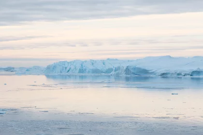 Photo of a large iceberg floating on top of a body of water, Greenland, October 2017, Reinder Nijhoff
