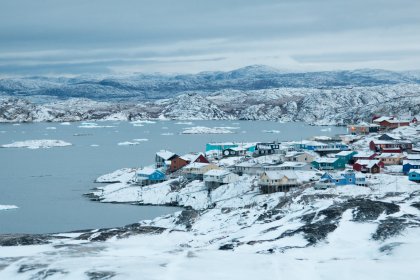 Photo of a small village on a small island in the middle of a lake, Greenland, October 2017, Reinder Nijhoff