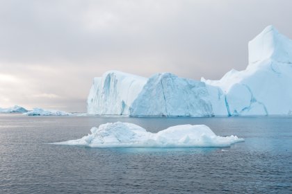 Photo of a large iceberg floating in the middle of the ocean, Greenland, October 2017, Reinder Nijhoff
