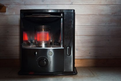 Photo of a black stove with a red light inside of it, Greenland, October 2017, Reinder Nijhoff