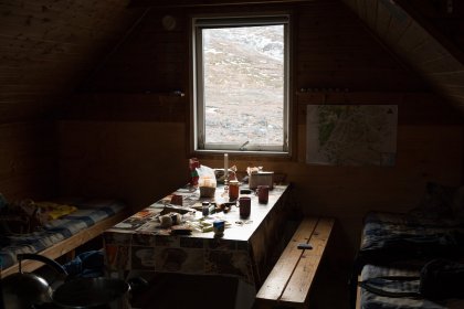 Photo of a room with a table and a window in it, Greenland, October 2017, Reinder Nijhoff