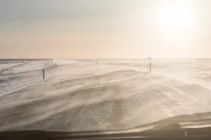 Photo of a view of the ocean from inside a vehicle, Winter Iceland, January 2018, Reinder Nijhoff