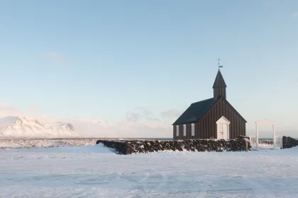 Photo of a church in the middle of a snowy field, Winter Iceland, January 2018, Reinder Nijhoff