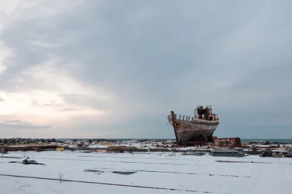 Photo of a ship sitting on top of a snow covered field, Winter Iceland, January 2018, Reinder Nijhoff