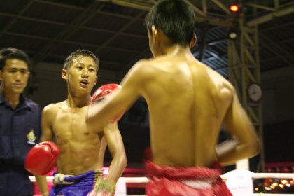 Photo of a man standing next to another man in a boxing ring, Thailand, Laos, Cambodja & Vietnam, November 2005, Reinder Nijhoff