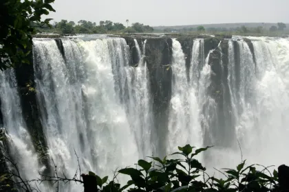 Photo of a large waterfall with water falling down it's sides, Zimbabwe, Mozambique & South Africa, December 2006, Reinder Nijhoff