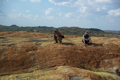Photo of a couple of people sitting on top of a hill, Zimbabwe, Mozambique & South Africa, December 2006, Reinder Nijhoff
