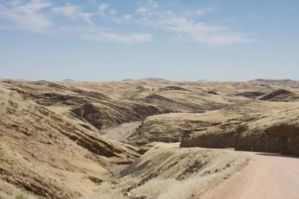 Photo of a dirt road in the middle of a desert, Namibia, May 2008, Reinder Nijhoff