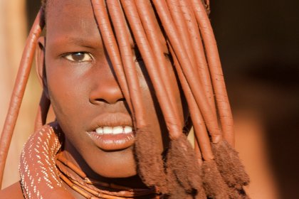 Photo of a close up of a person with a bunch of hair, Namibia, May 2008, Reinder Nijhoff
