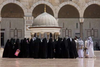 Photo of a group of people standing in front of a building, Jordan, Syria, Lebanon, May 2009, Reinder Nijhoff