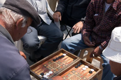 Photo of a group of men playing a game of checkers, Jordan, Syria, Lebanon, May 2009, Reinder Nijhoff