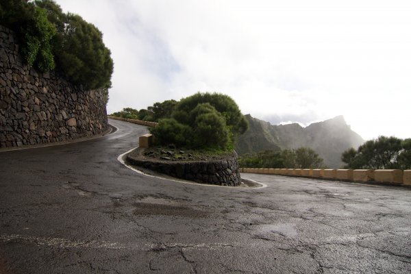 Photo of a curved road with a stone wall on the side, Tenerife, March 2011, Reinder Nijhoff